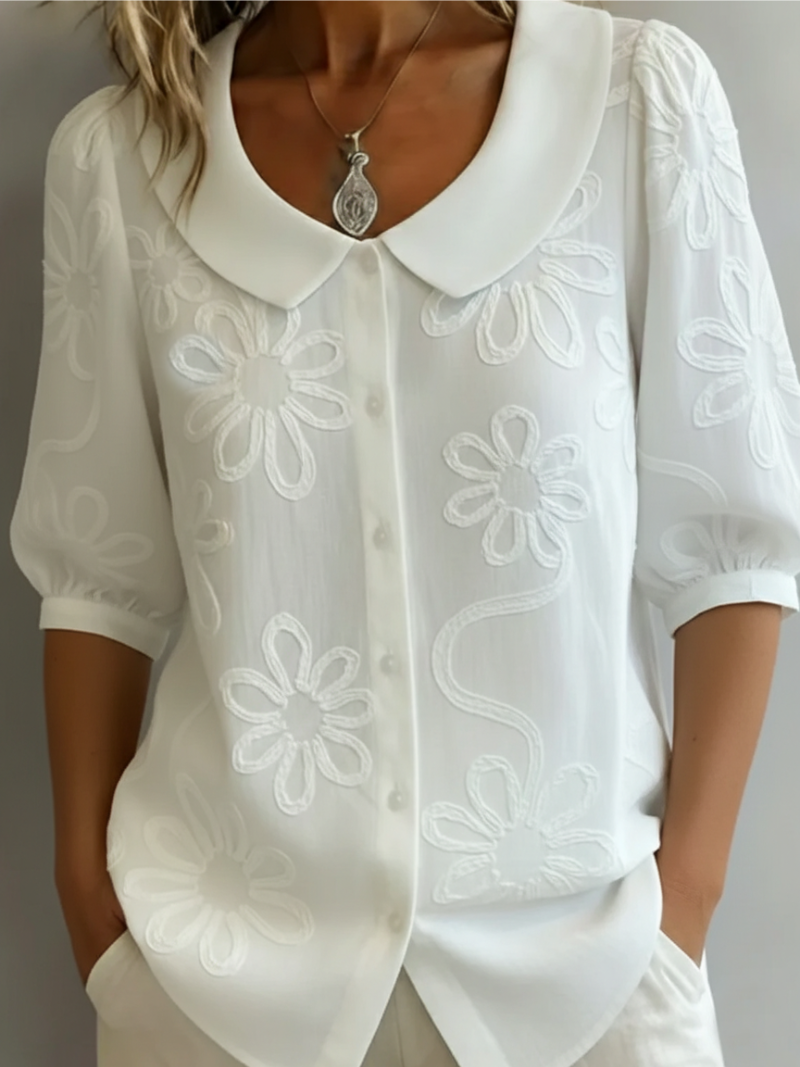 Sara – Blouse geborduurde bloemen