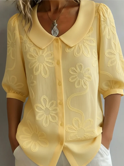 Sara – Blouse geborduurde bloemen