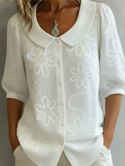 Sara – Blouse geborduurde bloemen